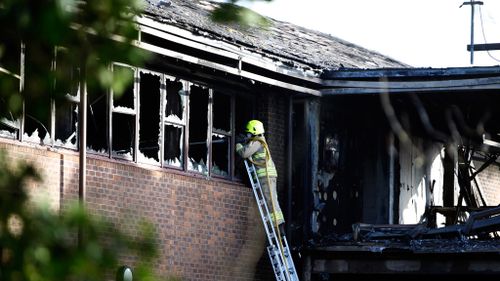 Firefighters attend the scene of the council office blaze in Oxfordshire. (AAP)
