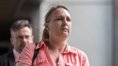 Linda Mason leaves the Brisbane Magistrates Court after the reopening of the inquest into the murder of her sister, 15-year-old Annette Jane Mason. (AAP)