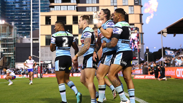 Sione Katoa celebrates scoring a try with teammates during the round 27 NRL match between Cronulla Sharks and Canberra Raiders at PointsBet Stadium.