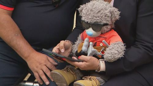 This teddy bear carries the ashes of Rob and Patrizia Cassaniti's son Christopher.