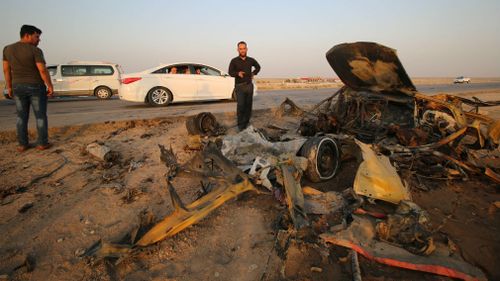 The damage at an international road in Dhi Qar, Iraq. (AFP)