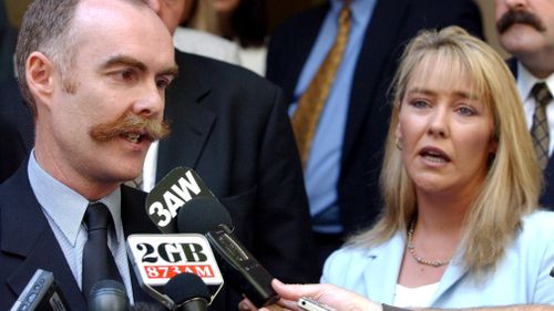 The wife of Rodney Miller, Carmel, alongside the murdered policeman's brother in 2006.