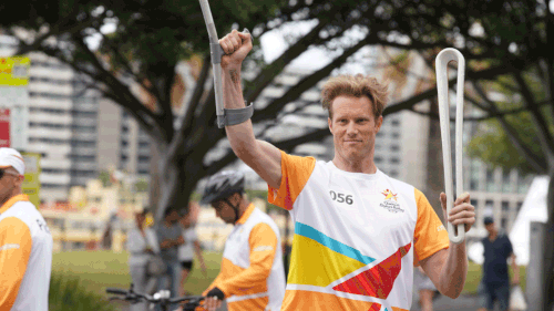 Radio presenter Tom Tilley during the Queen's Baton Relay in Sydney. (AAP)