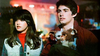 Gremlins stars Zach Galligan and Phoebe Cates.