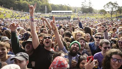 BYRON BAY, AUSTRALIA - JULY 23: Festival-goers are seen during Splendour in the Grass 2022 at North Byron Parklands on July 23, 2022 in Byron Bay, Australia. Festival organizers cancelled the first day of performances due to heavy rain at the festival site. Splendour in the Grass is celebrating its 20th year in 2022 after the festival was cancelled in 2020 and 2021 due to the coronavirus pandemic. (Photo by Matt Jelonek/Getty Images)