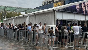 Thousands queue for hours to buy merch. But this is no Taylor Swift concert