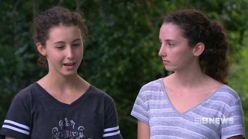 Alice and Jade Graham describe how the boat tipped over without any warning. (9NEWS)