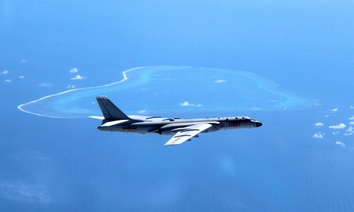 In this undated file photo released by Xinhua News Agency, a Chinese H-6K bomber patrols the islands and reefs in the South China Sea. The China Daily newspaper reported Saturday, May 19, 2018 that People's Liberation Army Air Force conducted takeoff and landing training with the H-6K bomber in the South China Sea. (Liu Rui/Xinhua via AP, File)