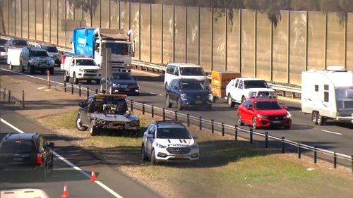 The man was attempting to cross the four-lane motorway around 10.50am before he was struck by the vehicle. Picture: 9NEWS.