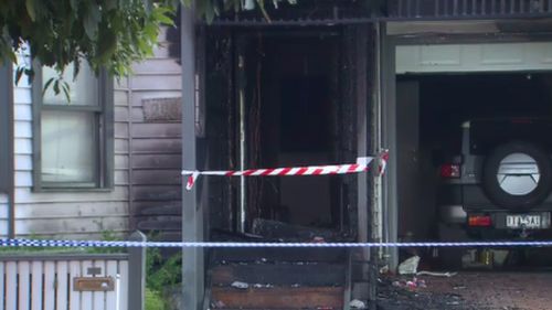 The home has been extensively damaged by fire and smoke.Police want to speak to this person. Picture: 9NEWS