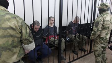 Two British citizens Aiden Aslin, left, and Shaun Pinner, right, and Moroccan Saaudun Brahim, center, have been sentenced to death by pro-Moscow rebels in eastern Ukraine for fighting on Ukraine&#x27;s side. 