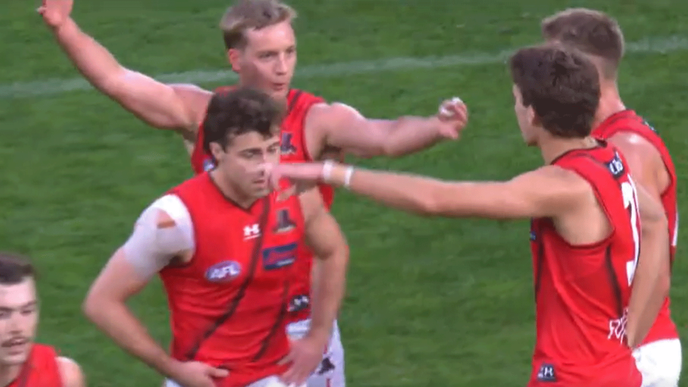 Dyson Heppell and Darcy Parish exchange