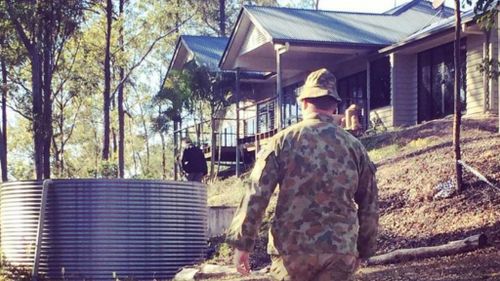 An ADF troop at the Pullenvale home. (9NEWS/Sean Power)
