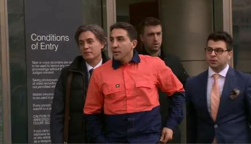 Acquaro (left) with Rocco Arico (orange shirt), one of his underworld figure clients. (Supplied)