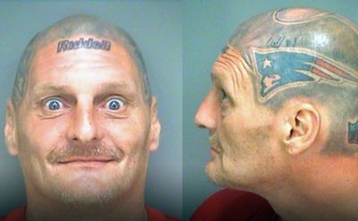 <b>A devout New England Patriots and Tom Brady fan has tattooed the quarterback’s helmet to his head.</b><br/><br/>Victor Thompson’s devotion to the three-time Super Bowl champions was revealed when he was arrested for possession of narcotics in Florida.<br/><br/>The mug shots show an amazing level of attention to detail with the artwork featuring logos, signatures and even the brand of the helmet, Riddell.<br/><br/>However, Thompson is not the only fanatical fan to visit the tattooist with their club’s crest and colours ...<br/>