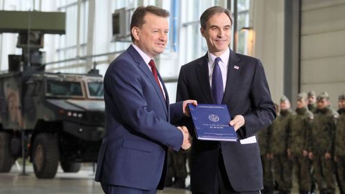 Polish Defence Minister Mariusz Blaszczak , left, and United States Ambassador to Poland Paul W. Jones during a ceremony of signing a contract for the purchase of US Patriot air and missile defence system in Warsaw. (Photo: AP).