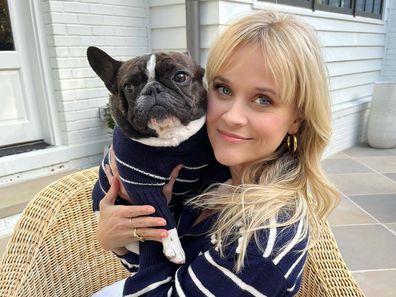 Reese Witherspoon with one of her dogs.