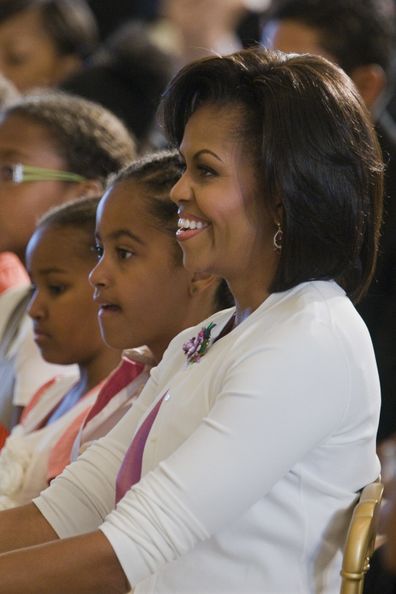Michelle Obama with daughters Sasha (left) and Malia.