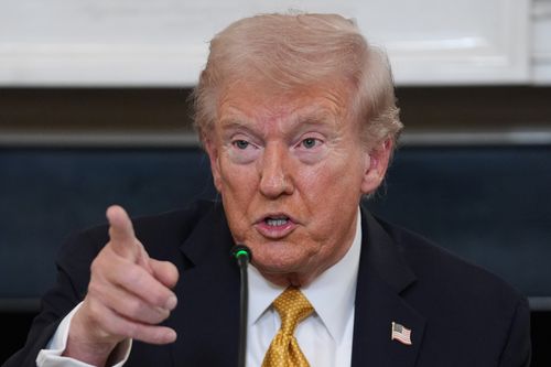 President Donald Trump answers questions from reporters during a roundtable on criminal cartels in the State Dining Room of the White House, Thursday, Oct. 23, 2025, in Washington. (AP Photo/Evan Vucci)