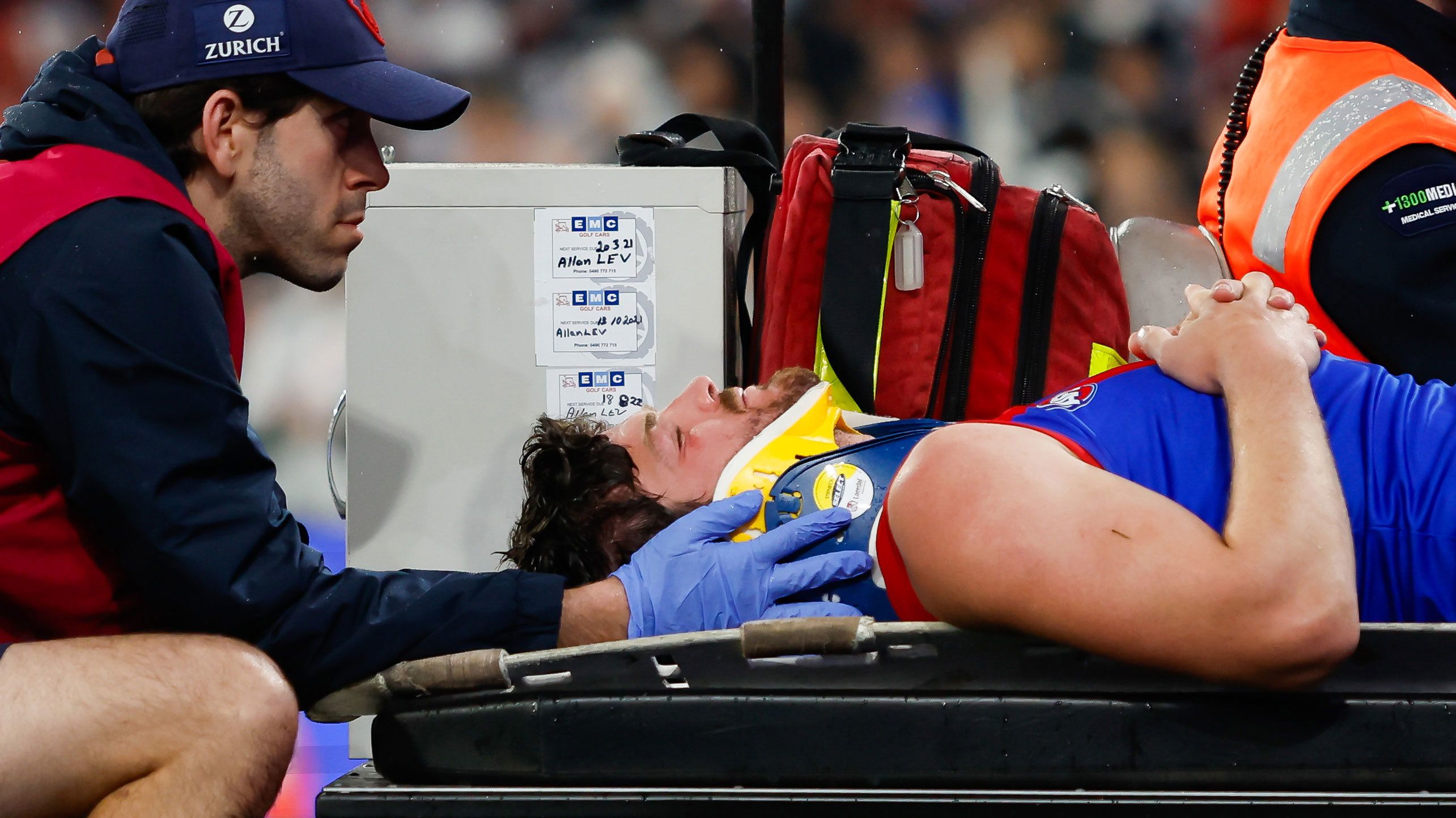 Angus Brayshaw leaves the field on a stretcher during the 2023 AFL qualifying final match between the Collingwood Magpies and the Melbourne Demons at Melbourne Cricket Ground on September 07, 2023 in Melbourne, Australia. 