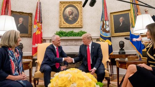 Malcolm Turnbull and Donald Trump shake hands in the Oval Office. (AAP)