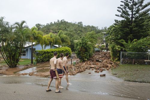 Rocks are seen blocking Muller Street in Wulguru.