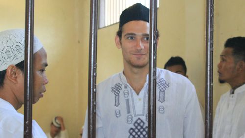 West Australian man Jake Drage in a waiting cell at the Cibadak District Court in Sukabumi, Indonesia. (AAP)