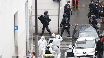 Police at the scene of a knife attack near the former offices of satirical newspaper Charlie Hebdo, Friday September 25, 2020 in Paris