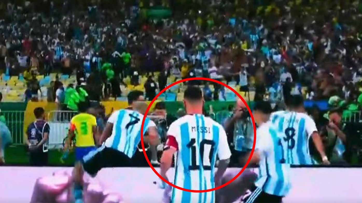 Lionel Messi leads Argentina side from field as fighting fans cause chaos