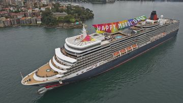 The luxury liner Queen Elizabeth gets on board with Mardi Gras celebrations (AAP)