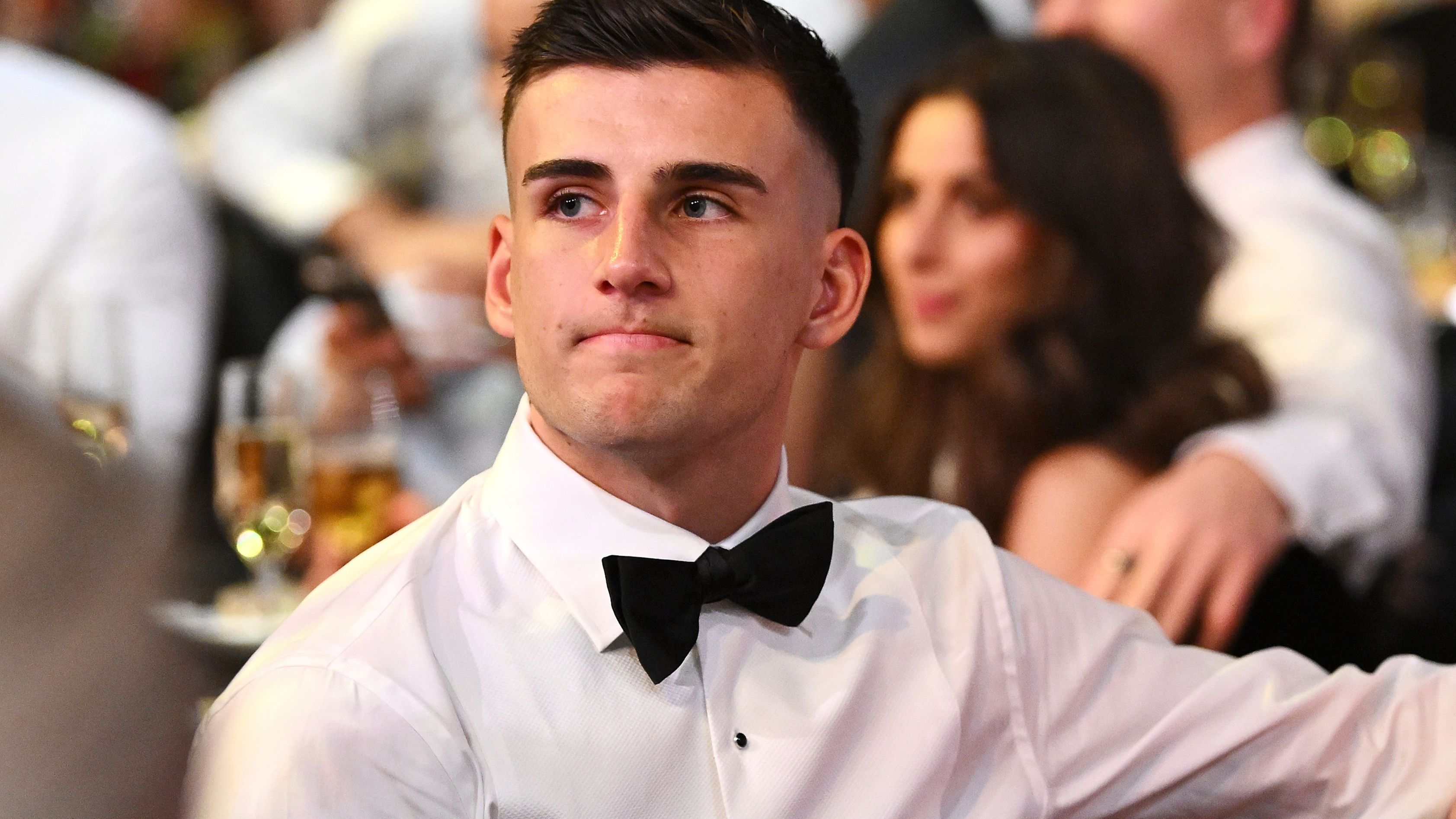 MELBOURNE, AUSTRALIA - SEPTEMBER 25:  Nick Daicos of the Magpies and Arlette Amor watch on during the 2023 Brownlow Medal at the Crown Palladium on September 25, 2023 in Melbourne, Australia. (Photo by Quinn Rooney/Getty Images)