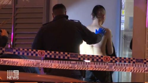 Police are hunting for seven men after a stabbing in Sydney's west.