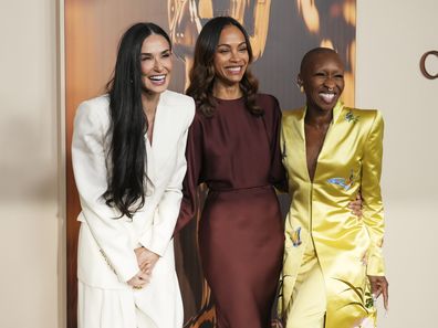 Demi Moore, dari kiri, Zoe Saldana, dan Cynthia Erivo tiba di Oscar Nominees Dinner pada hari Selasa, 25 Februari 2025, di Academy Museum of Motion Pictures di Los Angeles. 