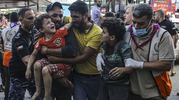 Wounded Palestinian children arrive to al-Shifa hospital, following Israeli airstrikes on Gaza City, central Gaza Strip, Tuesday, Oct. 17, 2023. 