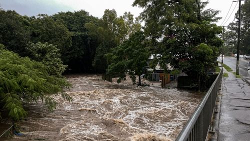 Flooding along Ithaca Creek in Bardon and Red Hill on Sunday, February 27, 2022. Credit: Matt Dennien
