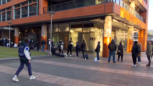 Long, snaking lines are becoming a fixture outside the passport office at Haymarket in Sydney.