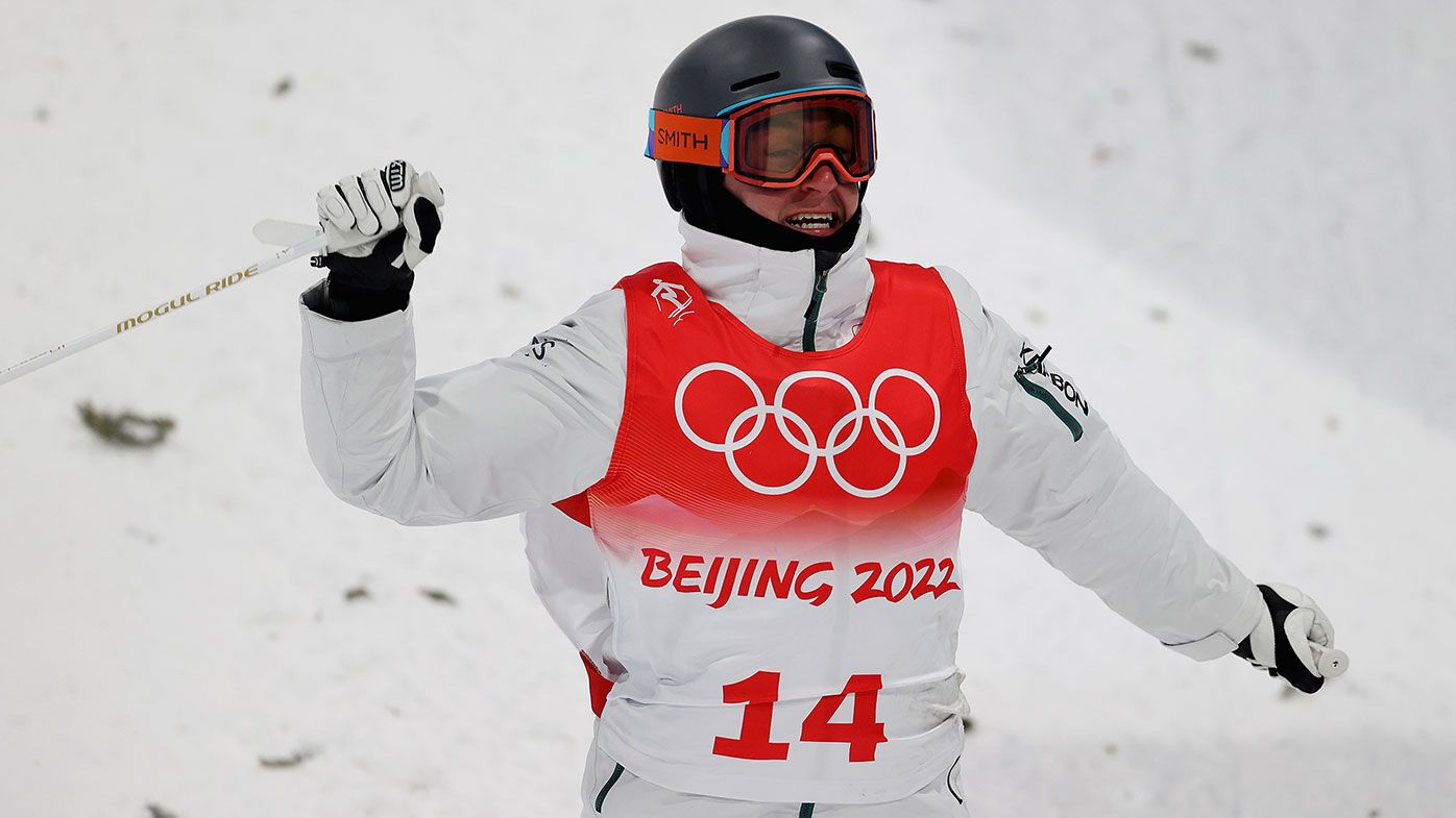Cooper Woods of Team Australia reacts at the end of a run during the Men&#x27;s Freestyle Skiing Moguls Final