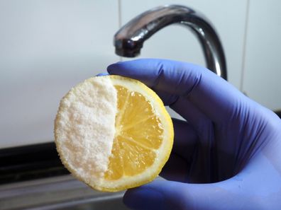 lemon with baking soda on top for cleaning