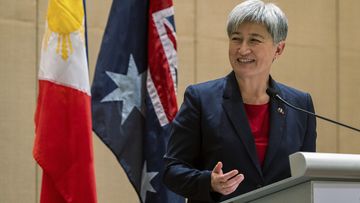 Australian Foreign Minister Penny Wong speaks beside Philippine Foreign Affairs Secretary Enrique Manalo during a joint press conference at a hotel in Makati City, Philippines on Thursday May 18, 2023