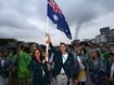 Aussies arrive! Rain pours down on glorious green and gold in Paris