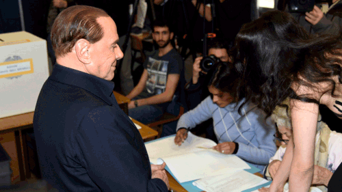 Silvia Berlusconi turned away after the protester confronted him on Sunday, March 4. (AAP)