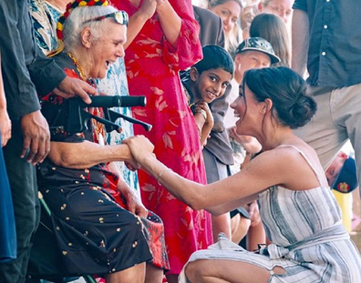 Meghan greeting fans during the royal tour of the Pacific.