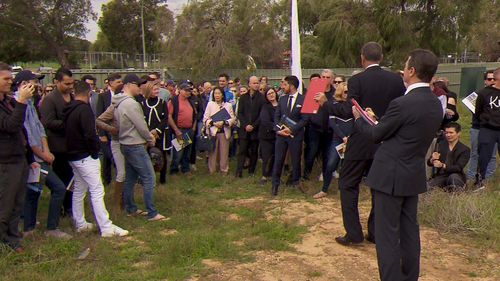 Dozens turned up for the auction, but there were only five contenders. Picture: 9NEWS