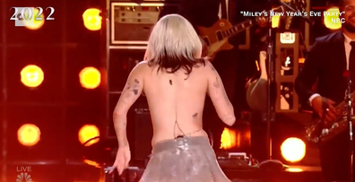 Miley Cyrus recovers seamlessly from awkward wardrobe malfunction on stage for 'Miley's New Year's Eve Party' broadcast by NBC.