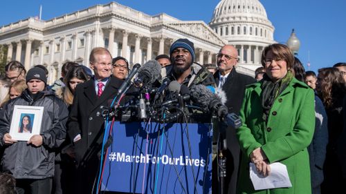 Student Robert Edwards speaks alongside lawmakers and gun control activists at the US Capitol in Washington, a day before the March for Our Lives movement rally. (AAP)