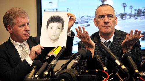 Taken in 2009, private investigator Dave Edgar with McCann spokesman Clarence Mitchell holding an e-fit of a 'Victoria Beckham lookalike' they believe may have information about missing Madeleine McCann. (Getty)