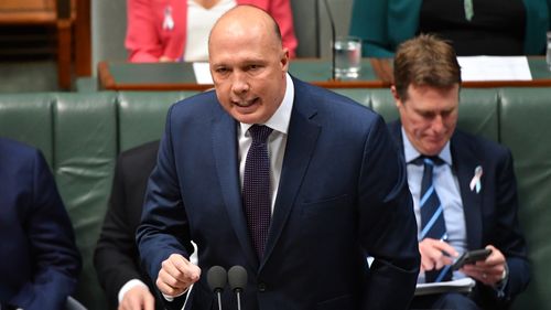 Dutton denies asylum seekers dad entry on grounds of national security