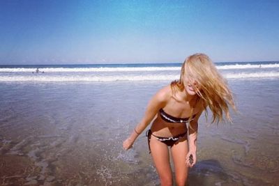 The Voice's Fely Irvine just keeps those sexy Insta-snaps coming!<br/><br/>The former Hi-5 singer posted this latest pic from her day at the beach in Sydney, enjoying the last rays of sun before winter takes hold.<br/><br/>Check out our slideshow of Fely and the rest of this year's Voice contestants' smoking-hot shots on social media. Class of 2014: The hottest ever?