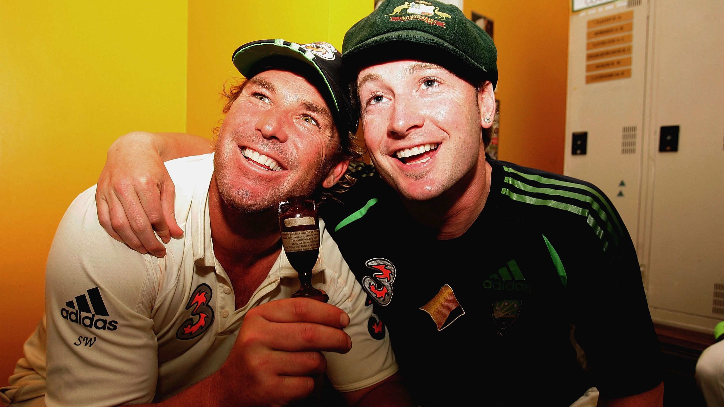Shane Warne and Michael Clarke pose with a replica Ashes urn in 2006.