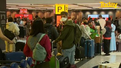 Australian airport passenger lines masks check-in